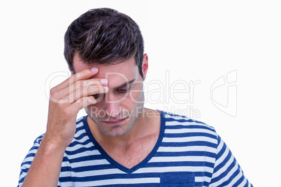 Close up of sad hipster with one hand on head