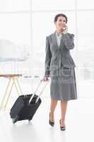 Businesswoman leaving for a work trip