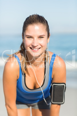 Portrait of beautiful fit woman looking at camera