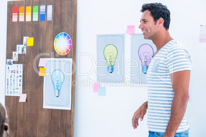 Creative man giving speech during a meeting