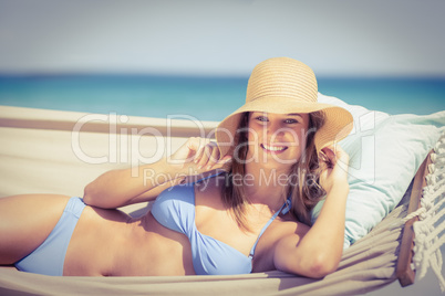 Pretty blonde resting in the hammock