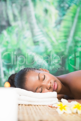 Beautiful woman lying on massage table