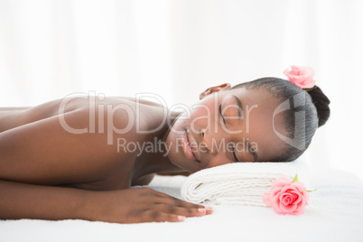 Pretty woman lying on massage table