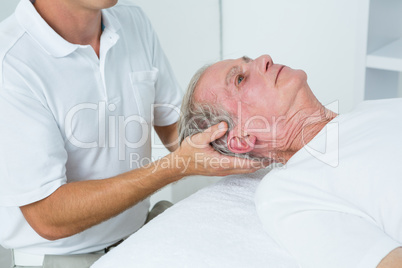 Man receiving neck massage Man receiving neck massage