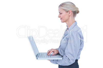 Businesswoman using laptop