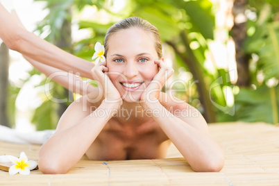 Attractive woman getting massage on her back