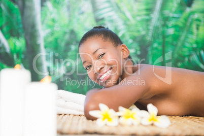 Pretty woman enjoying a hot stone massage