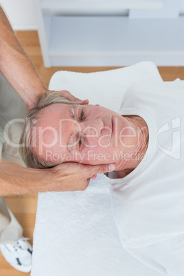 Man receiving neck massage