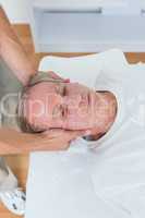 Man receiving neck massage