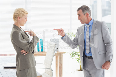 Boss yelling at colleague
