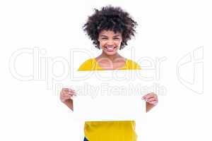 Pretty hipster holding blank sign