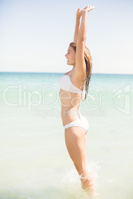 Pretty blonde standing into the sea Pretty blonde standing into the sea