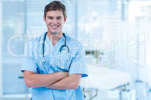 Smiling doctor looking at camera