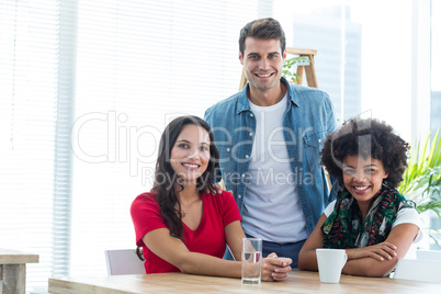 Young colleagues in discussion at office