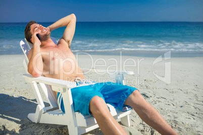 Man having phone call at the beach