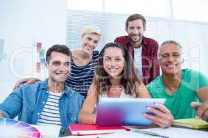 Business people using digital tablet in office