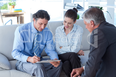 Couple in meeting with a financial adviser