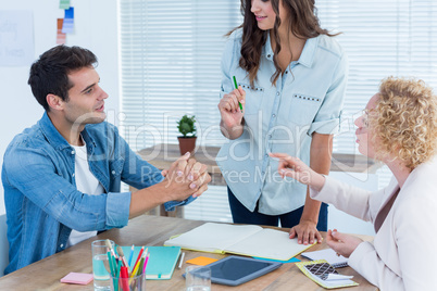 Attentive creative business people in meeting Attentive creative business people in meeting