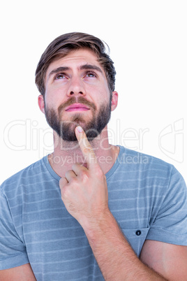 Handsome man thinking with finger on chin