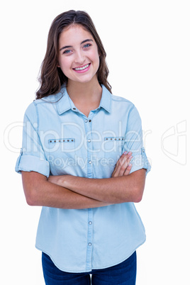 Pretty hipster with arms crossed smiling at camera Pretty hipster with arms crossed smiling at camera