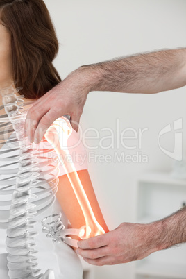 Highlighted bones of woman at physiotherapist