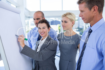 Business people looking at conference board