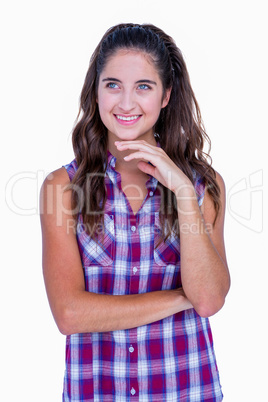 Thoughtful pretty brunette with fingers on chin