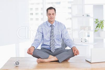 Businessman relaxing on his office
