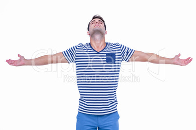 Handsome hipster with arms outstretched