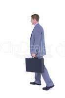 Handsome businessman holding a suitcase