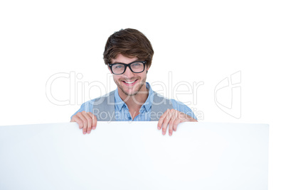 Handsome man holding blank panel