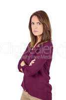 Unhappy woman looking at camera with arm crossed