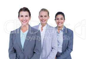 Smiling young businesswomen in a line