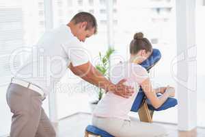 Woman having back massage