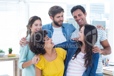 Group portrait of happy young colleagues