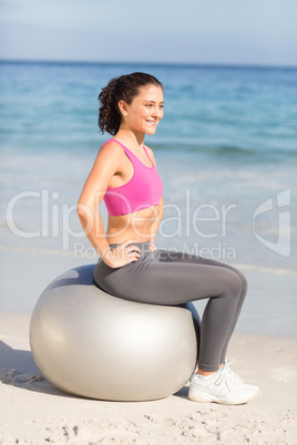 Fit woman doing fitness on exercise ball Fit woman doing fitness on exercise ball