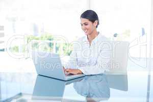 Businesswoman working with her laptop