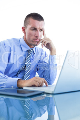 Businessman using his laptop