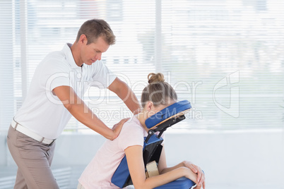 Woman having back massage