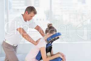 Woman having back massage