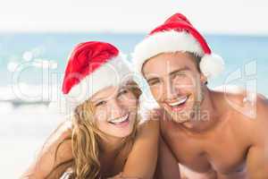 happy couple with Christmas hat