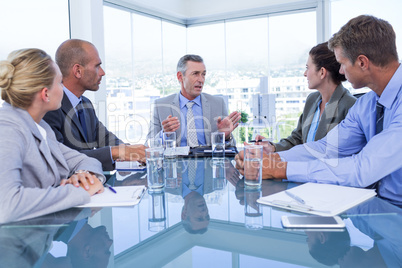 Business colleagues discussing about work