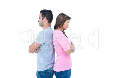 Angry couple standing back to back