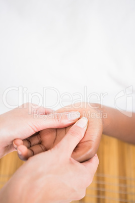 A woman enjoying a hand massage