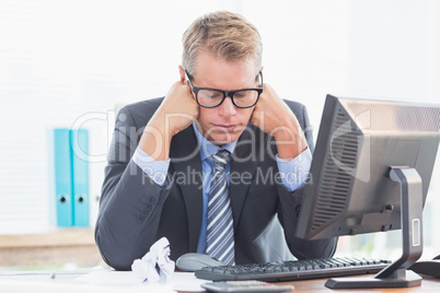 Businessman being depressed by accounting