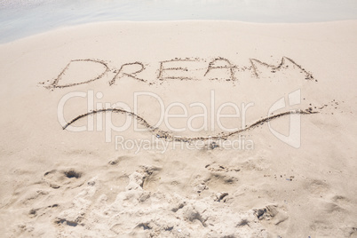 Inscription dream on sand