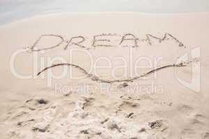 Inscription dream on sand