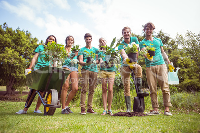 Happy friends gardening for the community