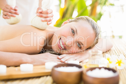 Attractive woman getting massage on her back