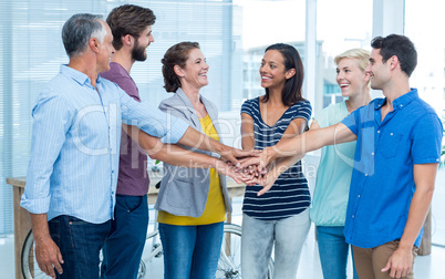 Business team stacking their hands